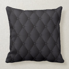 Schwarzes büscheliges ledernes kissen