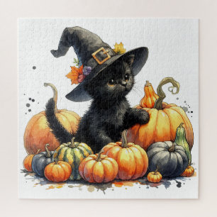 Schwarzes Halloween-Kätzchen mit Kürbissen und Hex