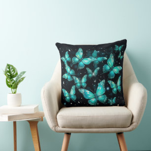 Schwarzes Kissen mit Aquamarinen Schmetterlingen