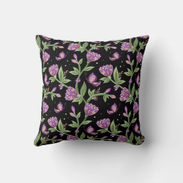Schwarzes Kissen mit violetten Blumen