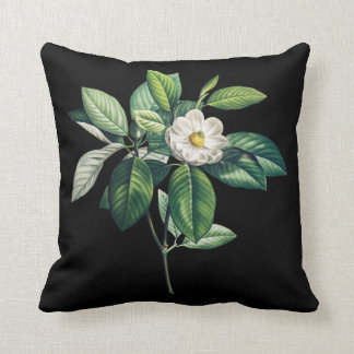 Schwarzes Kissen mit weißer Magnolie