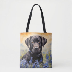 Schwarzes Labrador in Bluebonnets Tasche