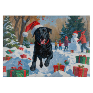Schwarzes Labrador-Weihnachtsfest-Schneeszene  Schneidebrett