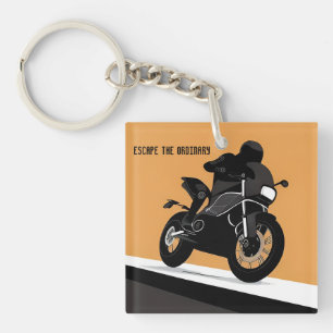 Schwarzes Motorrad mit orangefarbenem Hintergrund Schlüsselanhänger