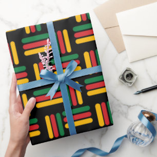 Schwarzes Muster in Gelb, Rot und Grün Geschenkpapier