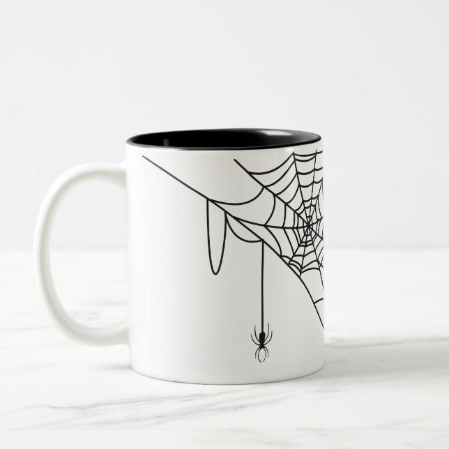 Schwarzes Spinnennetz und Spinne, Trick oder Trete Zweifarbige Tasse (Links)