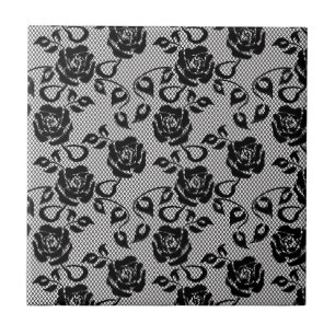 Schwarzes Spitzemuster auf weißem Hintergrund Fliese