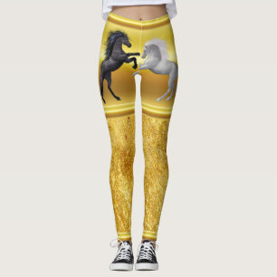Schwarzes und ein weißes Pferd, die kämpfen Leggings