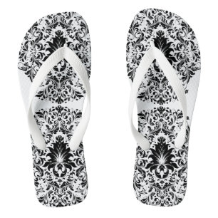 Schwarzes und weißes Blumenornament Flip Flops