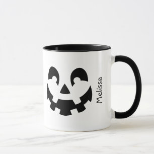 Schwarzes und weißes Kürbisgesicht mit Namen Hallo Tasse