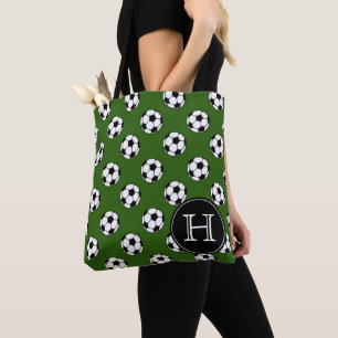 Schwarzweiss-Fußbälle auf grünem Monogramm Tasche