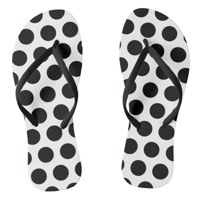 Schwarzweiss-Polka-Punkt drehen Reinfälle um Flip Flops (Fußbett)