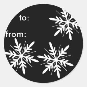 Schwarzweiss-Schneeflocke-Geschenk-Umbauten Runder Aufkleber