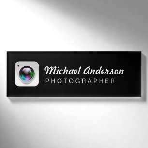 Schwarzweißfotografie-Kameraobjektiv-Logo Namenschild