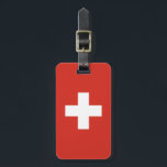 Schweizer Flagge - weißes Kreuz Gepäckanhänger<br><div class="desc">Die Flagge der Schweiz besteht aus einer roten Fahne mit einem weißen Kreuz in der Mitte. Die rote Schweizer Flagge ist ideal für Sportveranstaltungen,  Wohngestaltung,  Restaurants ,  Bars und Reisen. Text kann hinzugefügt oder entfernt werden und Größen können geändert werden. #Schweiz #whitecross #flag</div>
