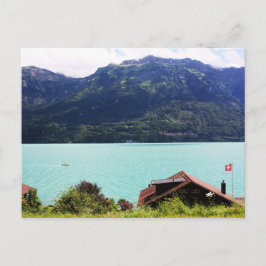 Schweizer Haus mit Flagge Postkarte