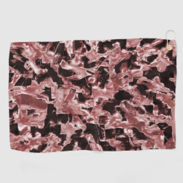 Schwimmende Kupfer- oder Gesteinsklingen auf dunkl Golfhandtuch