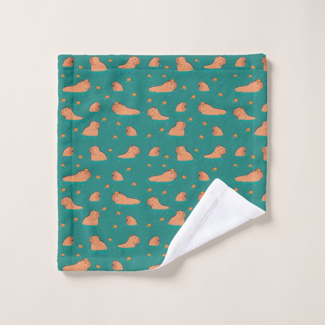 Schwimmkapybaras mit orangefarbenen waschlappen (Waschlappen)