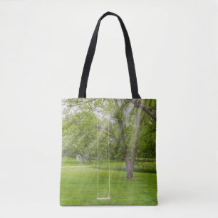 Schwingen in der Tasche mit Sonnenlicht