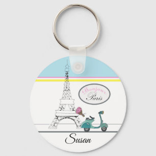 Scooter riding past the Eiffel Tower Paris France Schlüsselanhänger