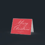 Script Merry Christmas Red White Feiertagskarte<br><div class="desc">Diese stilvolle und moderne Weihnachtskarte besticht durch eine elegante moderne Kalligraphie in Rot. Fügen Sie Ihren eigenen vorbedruckten Text hinzu oder löschen Sie einfach den Beispieltext,  um ihn für Ihre eigene handschriftliche Notiz leer behalten.</div>
