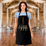 Script Monogram Black and Gold Whisky Schürze<br><div class="desc">Eine schicke Schürze mit einem eleganten Goldwhisk auf schwarzem Hintergrund mit Ihrem Namen und monogramm Set in stilvoller Typografie. Entwickelt von Thisisnotme©</div>