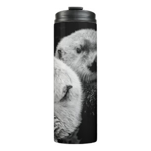 Sea Otters: Schwarz-weißes Paar. Thermosbecher