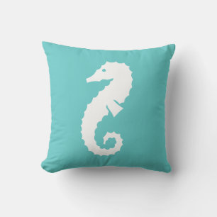 SEAHORSE BLANC sur coussin bleu turquoise
