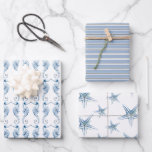 Seepferd an der Küste und Starfish Geschenkpapier Set<br><div class="desc">Do Tell A Belle's Küstenverpackungspapierblätter zeigen Muster meiner Aquarellfarben-Seepferde und Seesterne in Blautönen. Ein passendes gestreiftes Papier ergänzt das Design. Eine nautische Wahl für Ihre Geschenkverpackung für Hochzeiten am Strand und Geburtstagsfeiern. Weitere Designs von Victoria Grigaliunas finden Sie unter www.zazzle.com/dotellabelle</div>