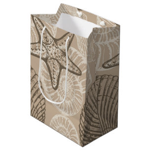 Seesterne und Muscheln in Beige an der Meereswelt Mittlere Geschenktüte