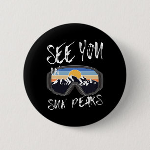 Sehen Sie sich in den Sonnenstrahlen Urlaub Skibri Button