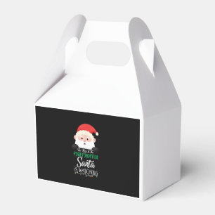 Sei nett zu dem Feuerwehrmann, den Weihnachten sie Geschenkschachtel