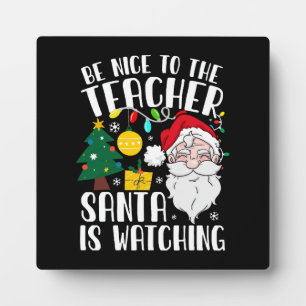 Sei nett zum Lehrer, der Weihnachtsmann beobachtet Fotoplatte