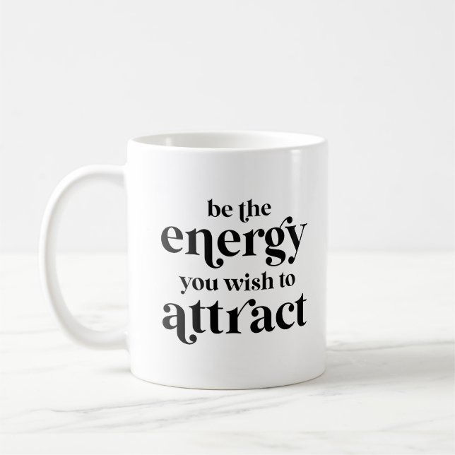 Seien Sie die Energie, die Sie anziehen möchten Kaffeetasse (Links)