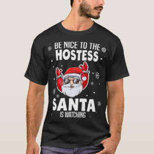 Seien Sie nett zu der Hostess Santa sieht die Sonn T-Shirt
