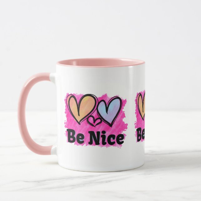 Seien Sie nette Wasserfarbenherzen Tasse (Links)