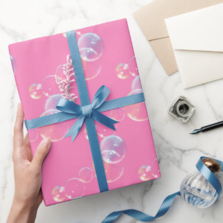 Seifenblasen auf rosa geschenkpapier