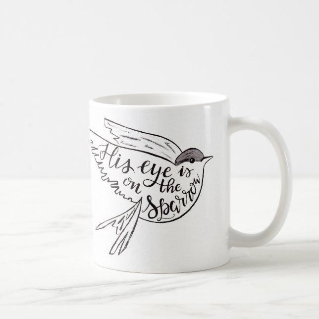 Sein Auge ist auf dem Spatzen Kaffeetasse (Rechts)