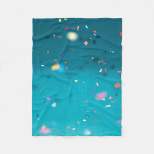 Selektive Fokusfotografie des bunten Konfektes Fleecedecke