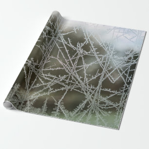 Selektiver Fokus von Schneeflocken Geschenkpapier
