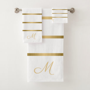 Serviette de bain motif à rayures blanches et doré