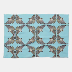 Serviette de cuisine bleu à l'épaule rouge