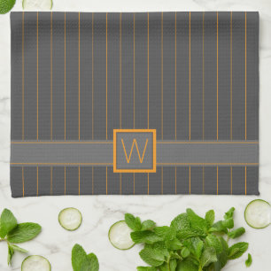 Serviette de cuisine grise avec rayures orange