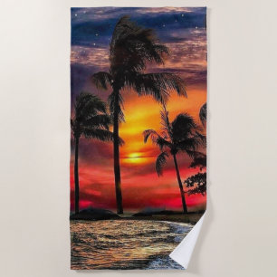 Serviette de plage au coucher du soleil avec l'océ