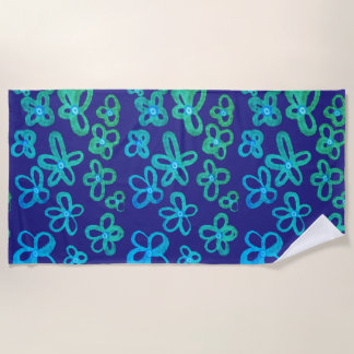 Serviette de plage aux fleurs bleues et sarcelles