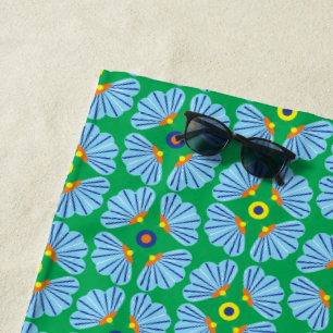 Serviette de plage aux fleurs de parasols