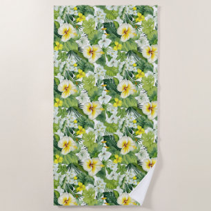 Serviette de plage aux fleurs tropicales