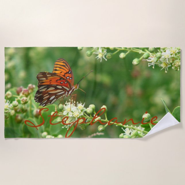 Serviette de plage orange de papillon avec le nom (Devant)