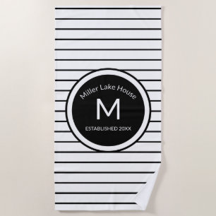 Serviette de plage rayée noire et blanche décorée