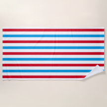 Serviette de plage rayée rouge, blanche et bleue